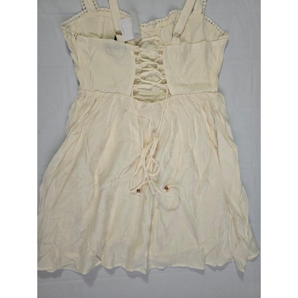Forever 21 Vanilla Mini Dress Lace Up Back Pom Pom Trim Cream Size L NWT - Picture 12 of 16